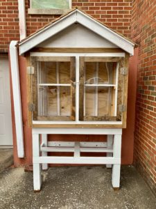 completed blessing box installed outside church building